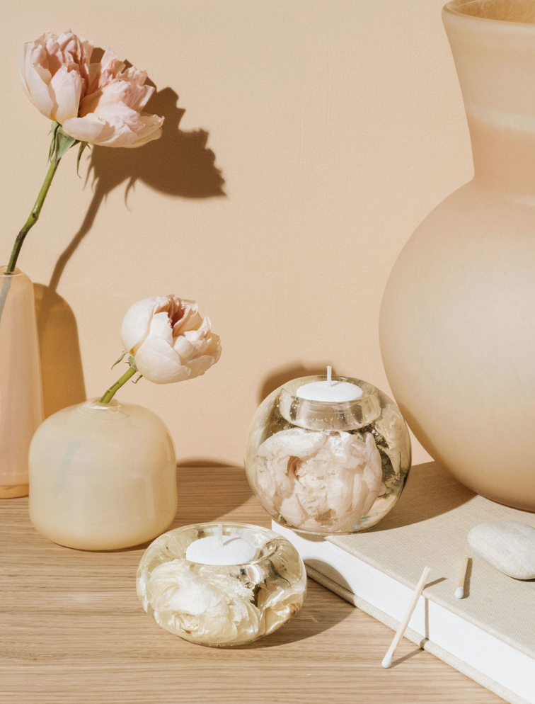 DIY flower preservation tealight candle holders by Soil & Soul, featuring real preserved wedding flowers in clear resin, styled with soft-toned ceramic vases, blush peonies, and neutral decor—ideal for romantic gifts, wedding keepsakes, and home styling inspiration.