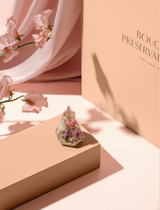 Soil & Soul bouquet preservation kit featuring a faceted resin ring holder with real preserved wedding flowers, styled with flowing blush fabric, delicate sweet pea stems, and elegant packaging—perfect for floral keepsakes and sentimental bridal gifts